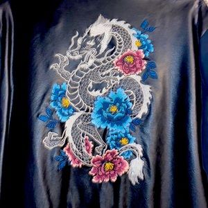 Size 1 torrid jacket with dragon and flower detail on the back